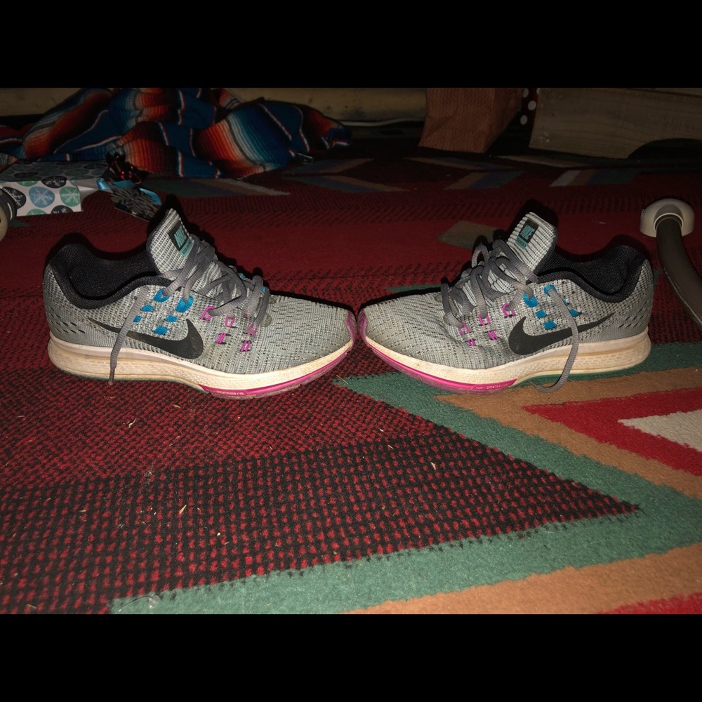 Grey pink and blue nike shoe